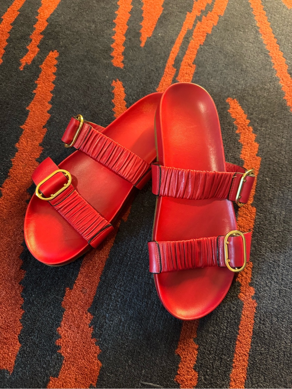Stuart Weitzman Shalene Red Slide Sandals with Gold Buckles